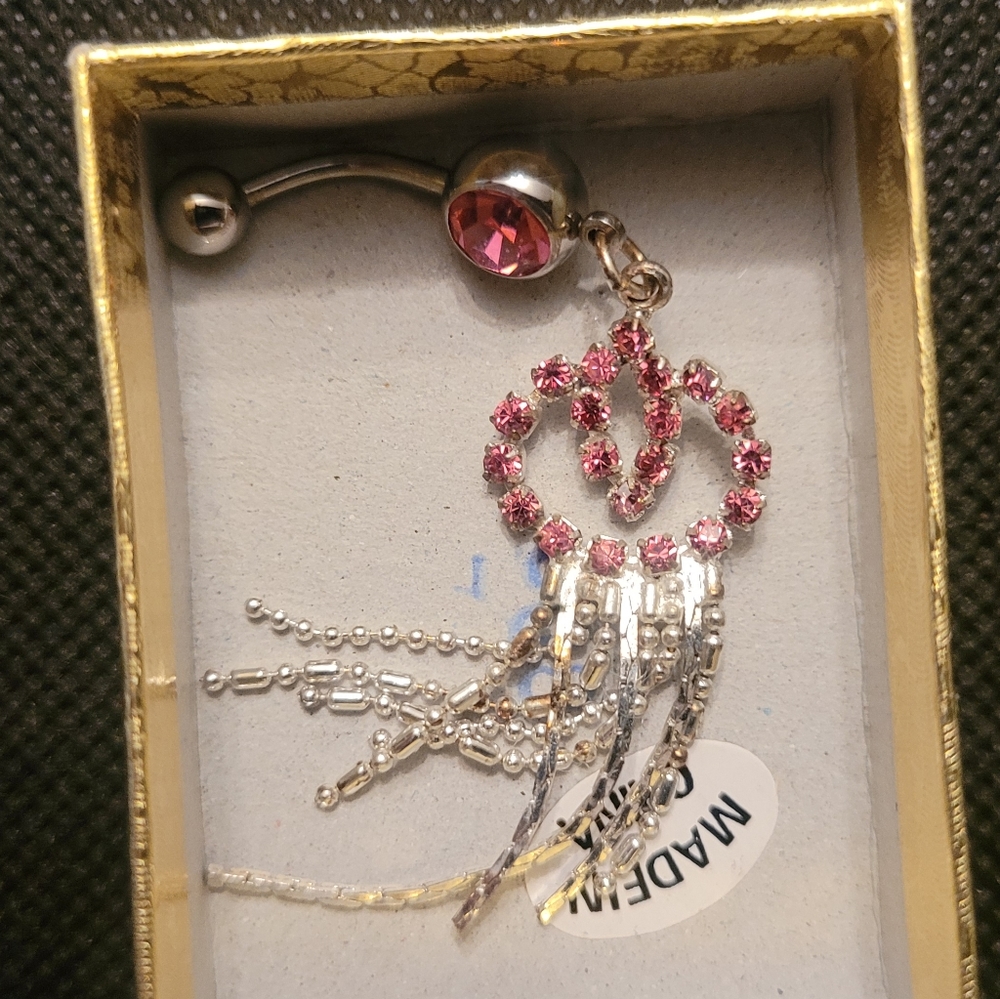 Pink dangling belly ring